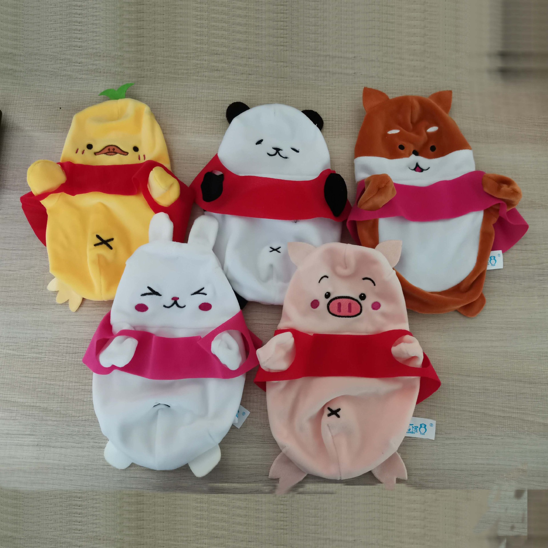 Fábrica directa de juguetes de peluche, cubierta de cuero, cubierta de cuero semiacabada, muñecas sin relleno transfronterizas en el extranjero