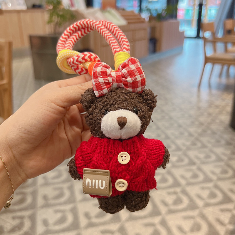 新商品のアニメの蝶結びのセーターの熊の車のキーホルダーのアイデアのぬいぐるみのカバンの装飾の女性