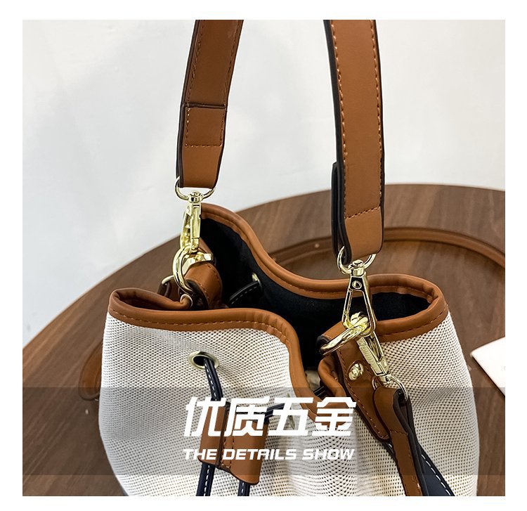 包包女2021新款帆布撞色水桶包质感单肩斜挎包