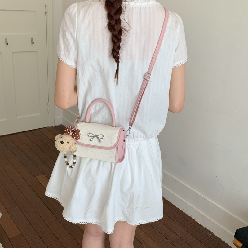 Bolso de arco rosa portátil para mujeres 2026 nuevo bolso de hombro de verano popular bolso de moda lindo