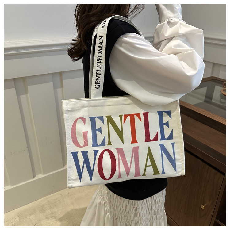 Large-capacity letter canvas bag 2025 new style ins printed versatile shoulder bag for commuting and portable ladies' tote bag undefined