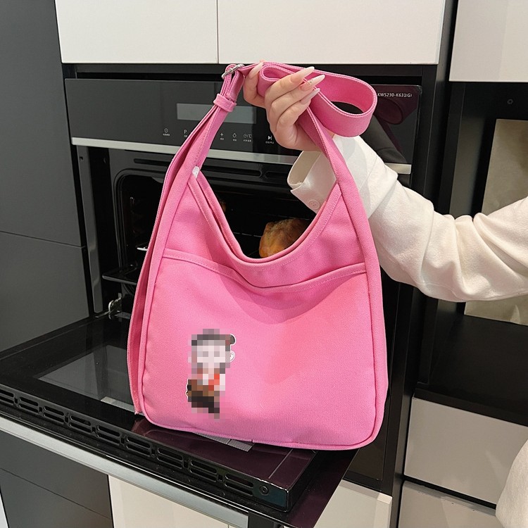 2025 nuevo bolso de lona bolso de hombro de gran capacidad para mujer bolso casual de todo fósforo para estudiantes en clase bolso de viaje