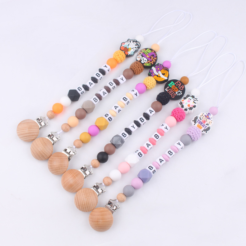 Productos para bebés, juguetes de planeta creativo, pinza de chupete de madera, cadena de chupete de silicona para bebés, cadena anti-caída