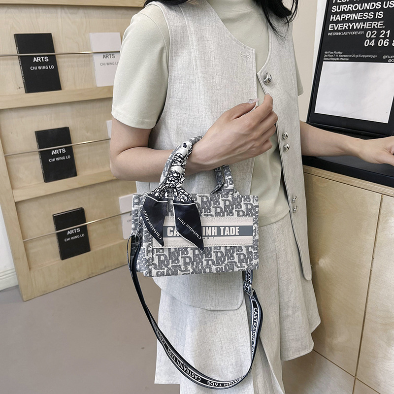 Bolsos de textura avanzada de mujeres nuevas bolsas de mano populares transfronterizas, bolsas de hombro de moda, mochila de viaje universal
