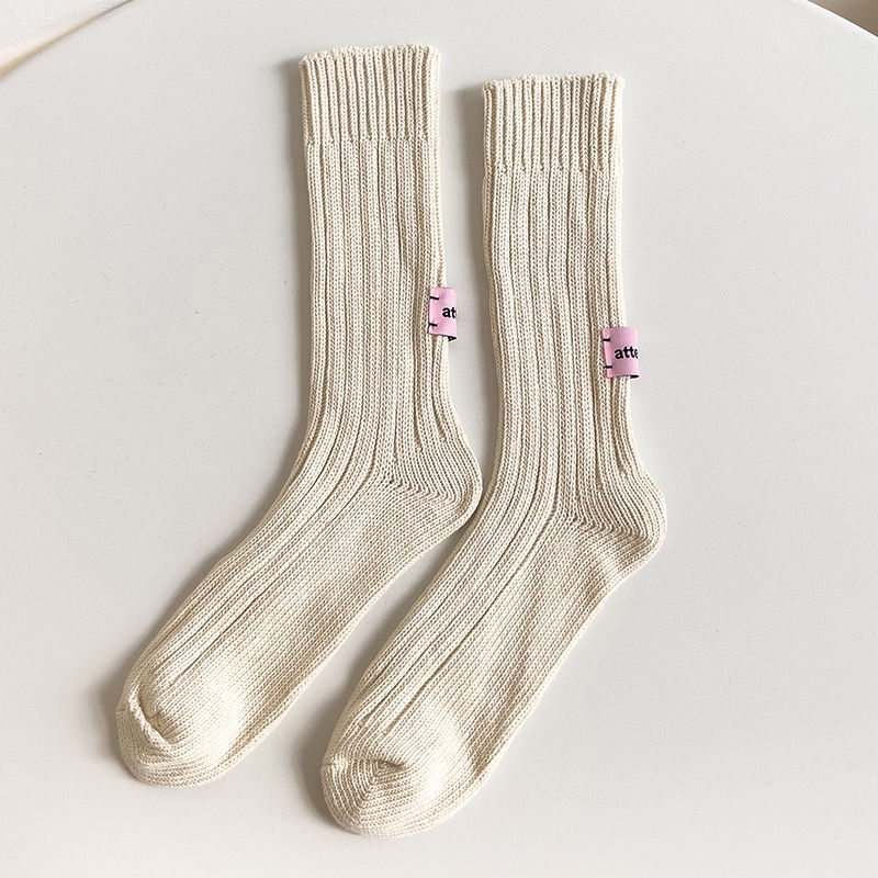 Nicho etiqueta rosa japonés retro color puro algodón crudo embrión línea gruesa media pantorrilla calcetines Otoño e Invierno hombres y mujeres calcetines largos de pila ins