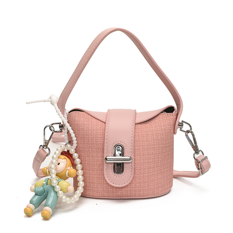 Bolso de hombro para niña de moda, muñeca linda, bolso de bebé colgante, nuevo mini bolso para niños 2025