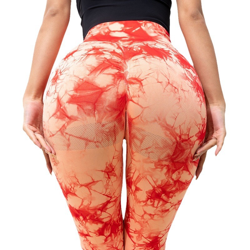 Pantalones de fitness de secado rápido de cadera teñidos anudados de cintura alta europeos y americanos, pantalones de yoga de nueve puntos de entrenamiento de compresión de levantamiento de cadera de melocotón transpirable