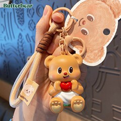 正規版のファッションのバターの熊のキーホルダーの女性のかわいい漫画の精巧な人形の射出成形のぬいぐるみのキーホルダーのペンダント