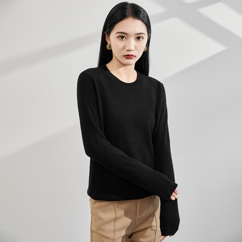 Demi-season cashmere solid color knitted sweater with a round collar