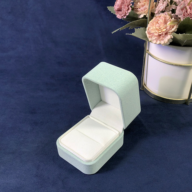 Cubierta de ángulo redondeado fresco caja de joyería de cuero PU caja de embalaje de joyería de moda anillo brazalete embalaje de joyería