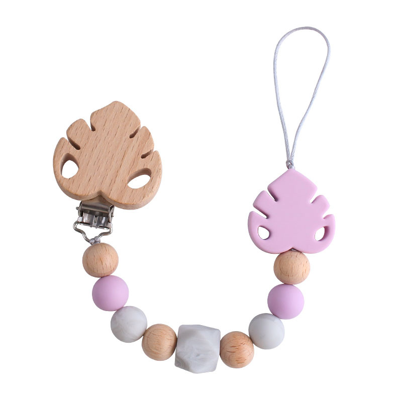 Suministros para bebés creativo clip de chupete de hoja de haya juguete mordedor bebé Cadena de chupete de hoja de silicona cadena anti-caída