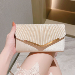 国境を越えた新しい絹織物の晩餐会は高級な宴会のハンドバッグを持って女性の名媛のしわの高級感の封筒を掛けます。