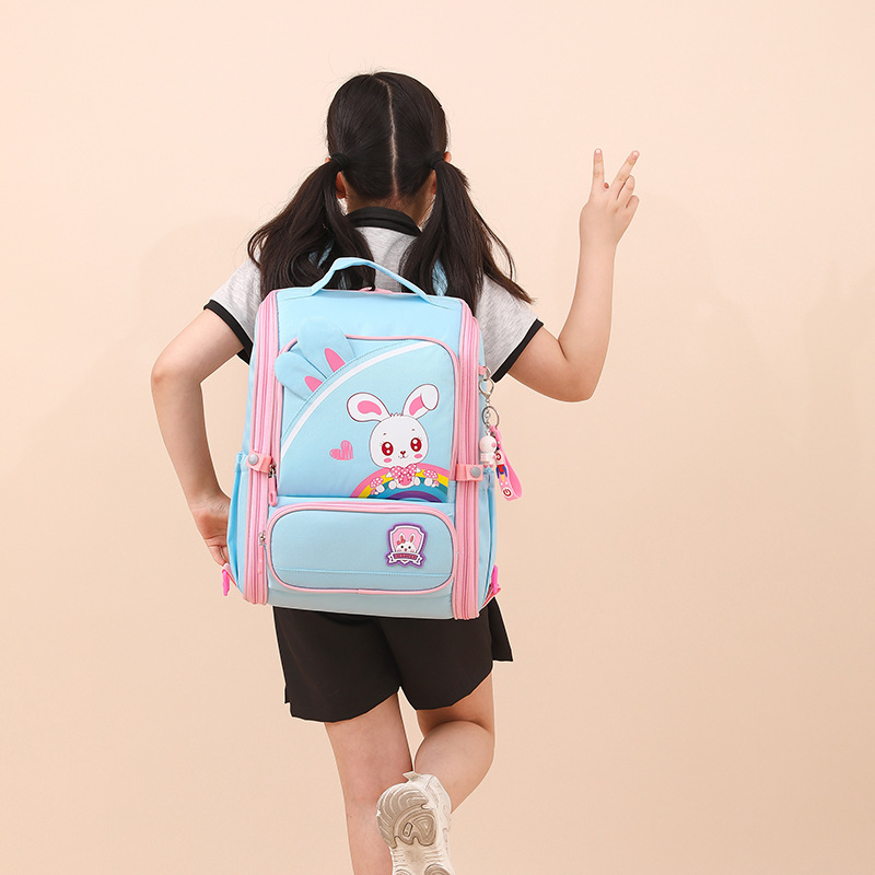 Mochila escolar con barra de tracción transfronteriza estudiantes de grado 2-45 niños y niñas de gran capacidad dibujos animados lindo subir escaleras de doble propósito hombros