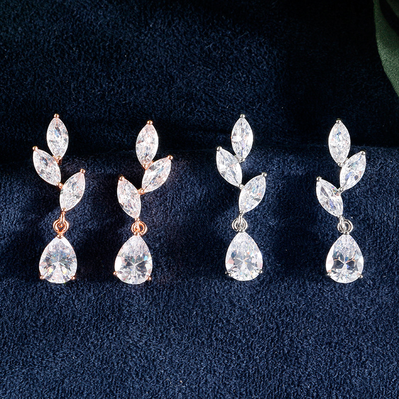 Small fresh classic sophisticated earrings drop-shaped with zircon