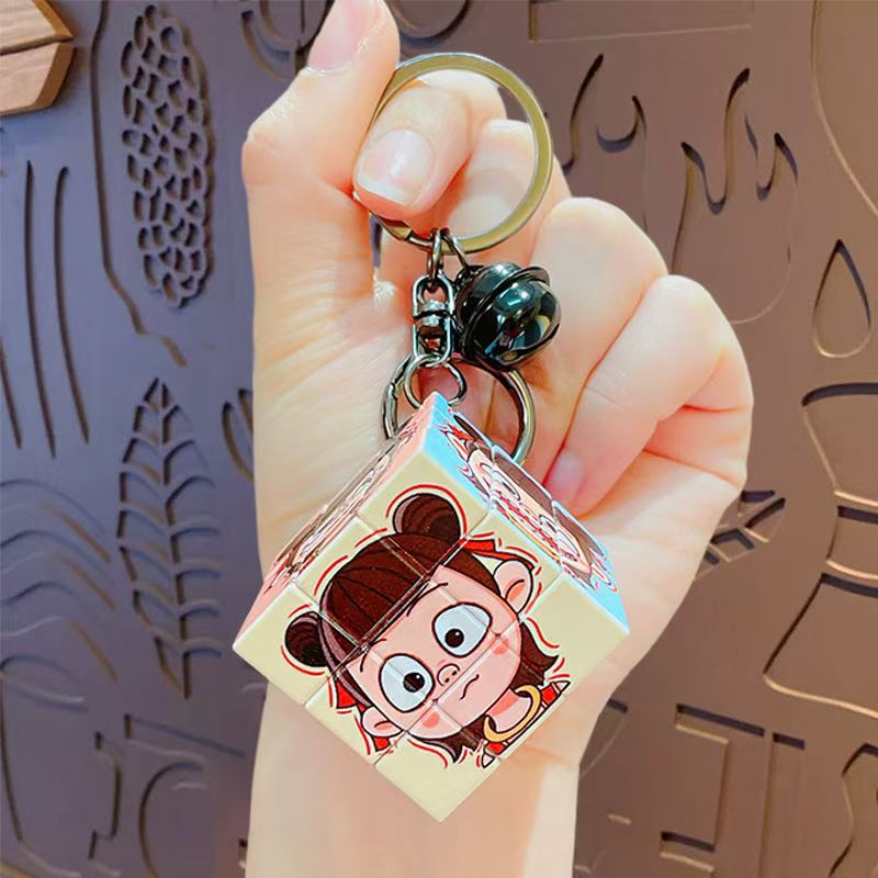 Nezha's Devil Boy Naohai Patrón de dibujos animados creativos Cubo de Rubik Llavero Bolsa Colgante Llavero Regalo pequeño al por mayor