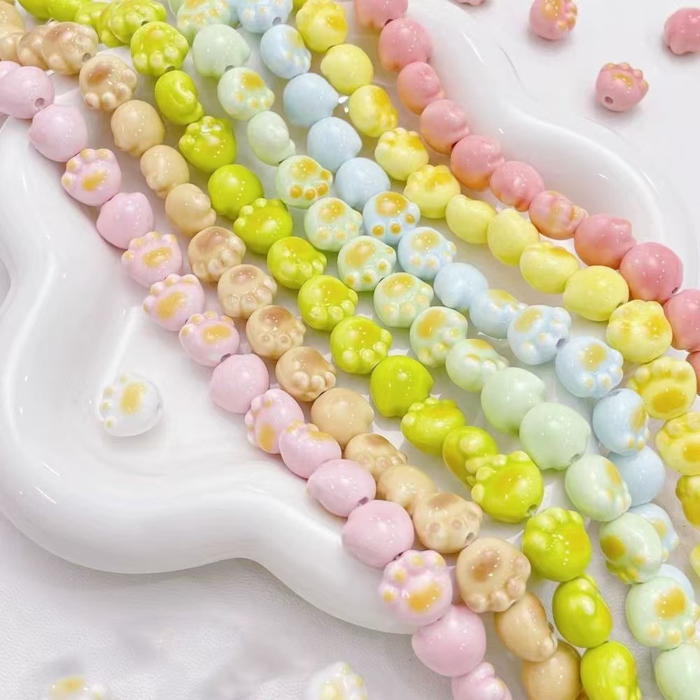 Cuentas de cerámica flor cuadrada estrella de cinco puntas pequeña flor de ciruelo trébol de cuatro hojas pequeño elefante pequeño conejo de jade color mixto cuentas de agujeros rectos cuentas hechas a mano