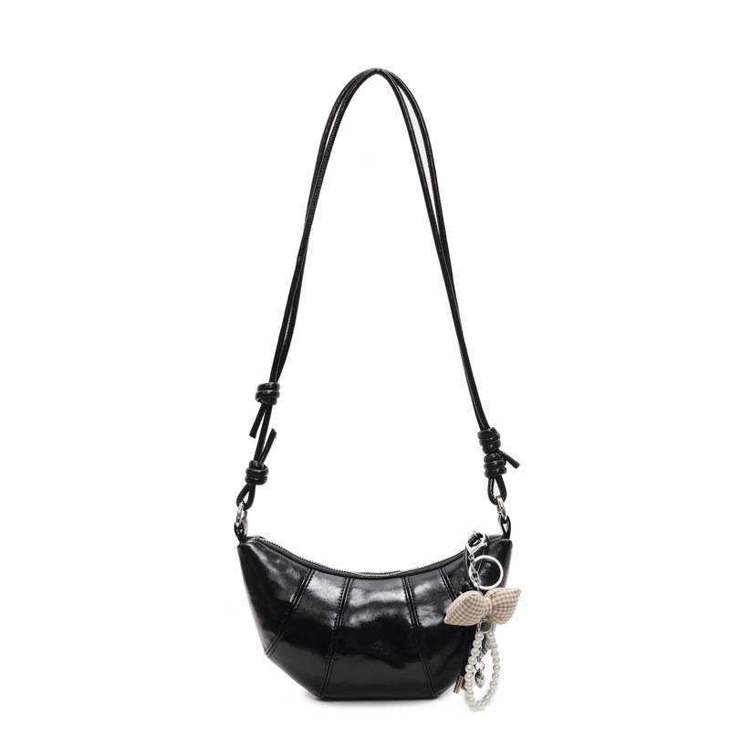 Bolso de todo fósforo de diseño de nicho para mujer 2025 nuevo bolso de cuerno de costura de color sólido bolso de axila de sentido avanzado de viaje casual