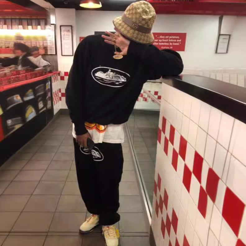 Pantalones con estampado de marca de moda americana Pantalones deportivos sueltos de marca de moda callejera europea y americana Pantalones grises de primavera y otoño