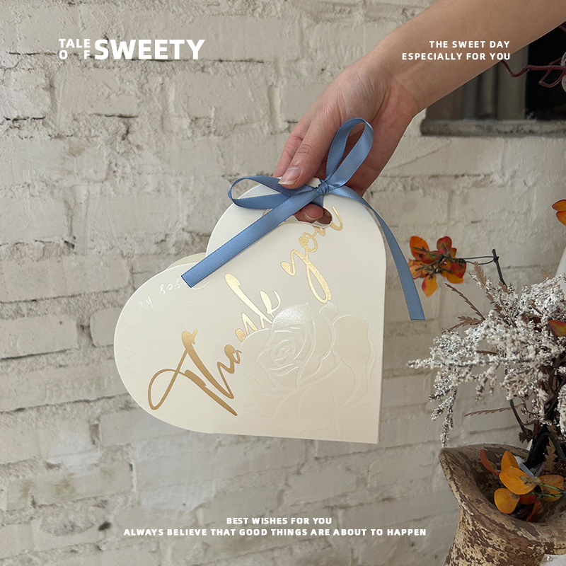 Nueva caja de dulces de boda bolsas de dulces portátiles de nicho simple caja de dulces de boda caja de regalo de alta calidad caja de papel