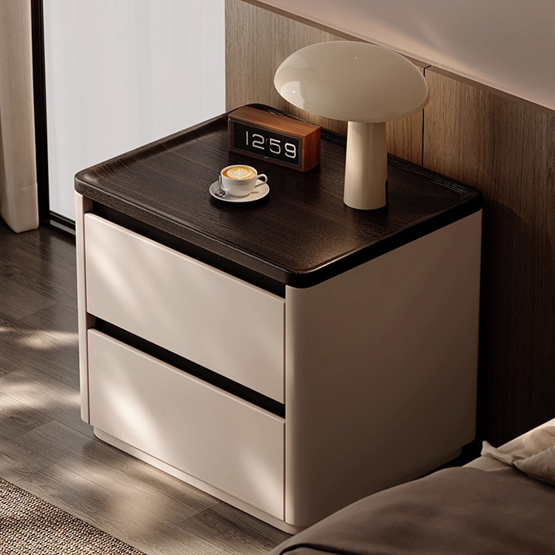 Minima mesita de cama de madera maciza2025 nuevo diseño de alta sensación de lujo ligero moderno y simple gabinete de cama de dormitorio familiar