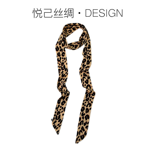 Elevated, versatile leopard and polka-dot silk scarf: a retro, edgy 