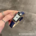 Blue band, white face