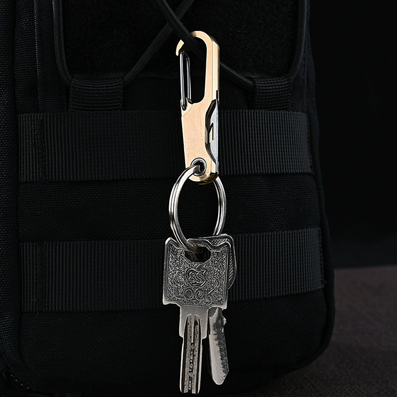 Brass keychain, sharp pocket knife, handheld box