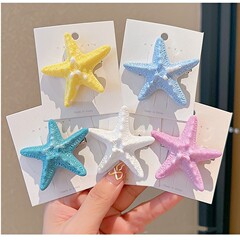 女性用の甘いヒトデ模擬ヘアクリップ、インスタイルのパーソナライズされたファッショナブルなカラフルなサイドクリップ、多用途のハイエンドのヘッドバンドとヘアアクセサリー