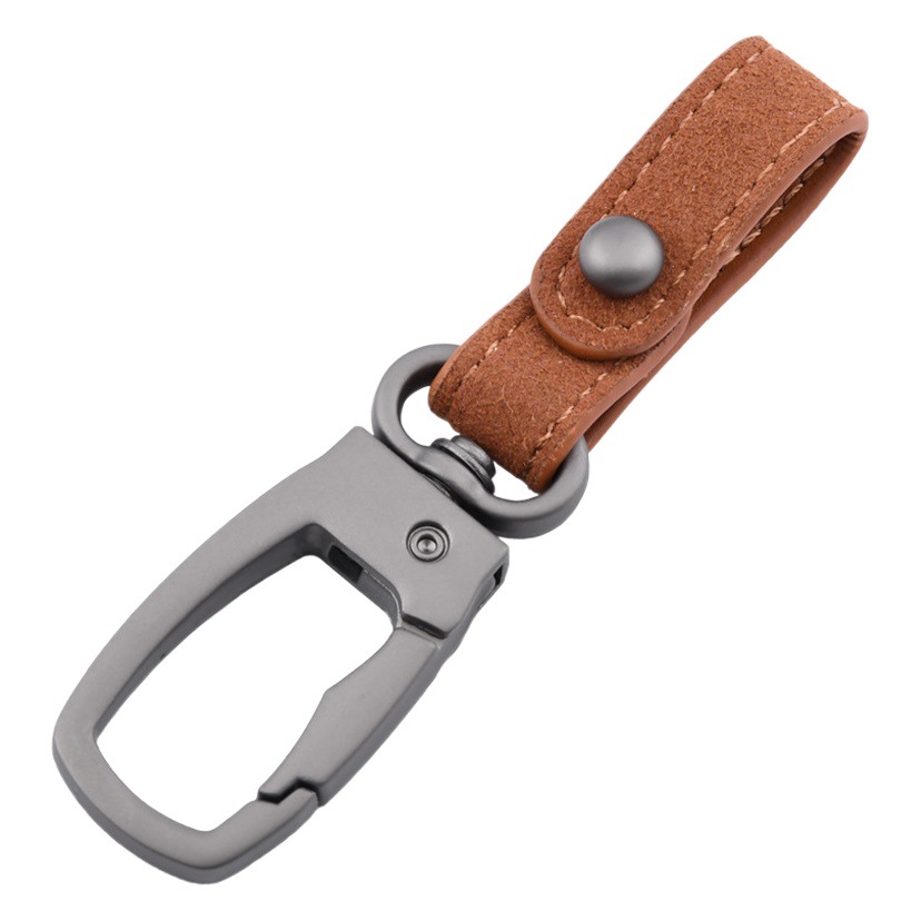 Colgante de llavero de flip de lujo ligero llavero de coche de cuero de alta gama llavero de pareja de moda para hombre