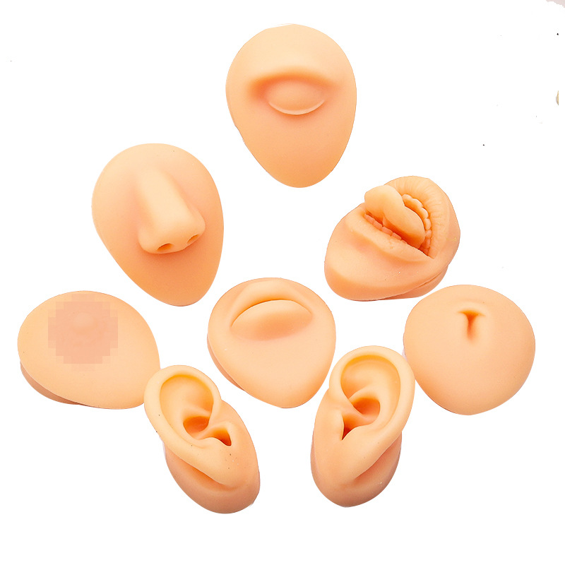 Simulación de cinco rasgos faciales, práctica de puntos de acupuntura del oído perforados, accesorios de enseñanza, clavos de lengua, clavos de nariz, pantalla de ombligo de boca, molde de silicona