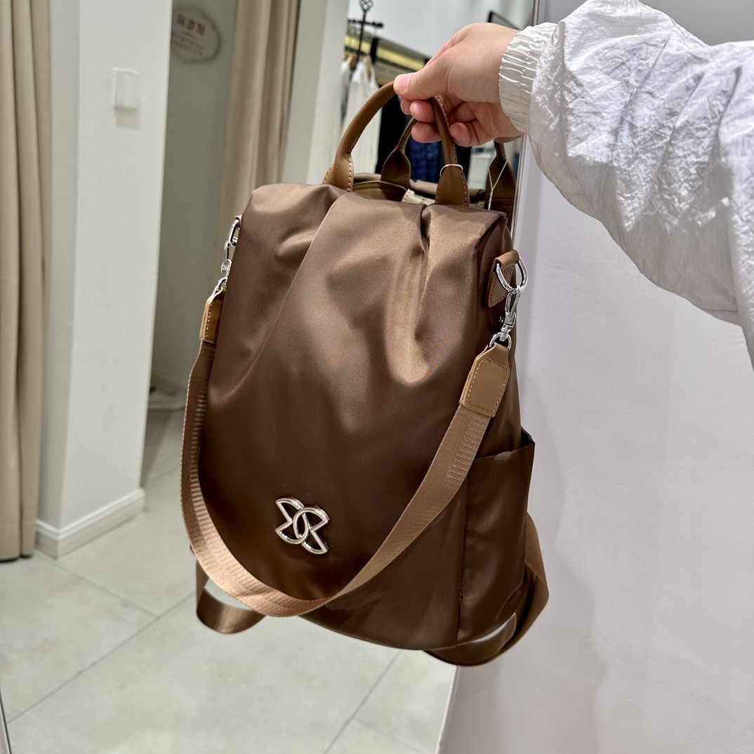 Mochila coreana para mujer, bolso de viaje, bolso de mujer para ir al trabajo, tela Oxford, mochila de estilo coreano, primavera transfronteriza, nueva para mujer