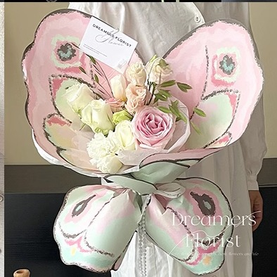 中秋节花店摆摊新款花朵蝴蝶翅膀花束包装纸鲜花包花材料花艺防水