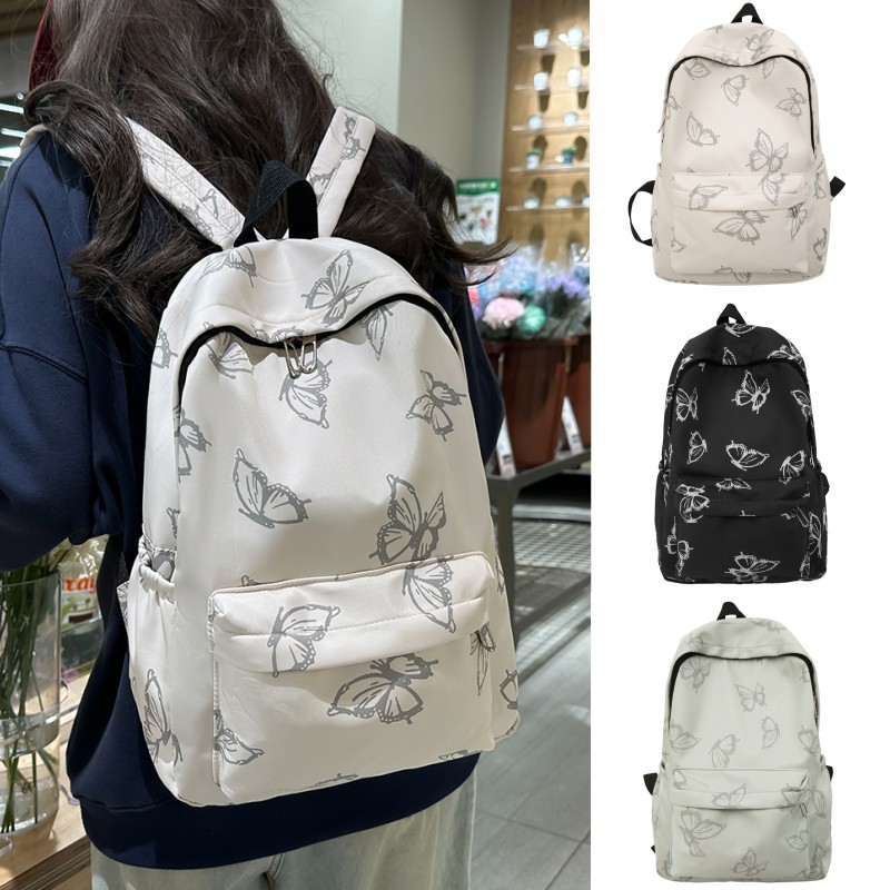 Nueva simple mochila de mariposa de dibujos animados estudiantes de primaria y secundaria mochila escolar del campus de gran capacidad de viaje ligero mochila de comercio exterior