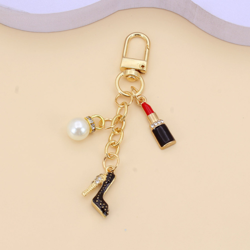 Xiaoxiangfeng ハイヒール口紅パールキーホルダー女性学生バッグペンダント DIY ヘッドフォン保護カバー装飾|undefined