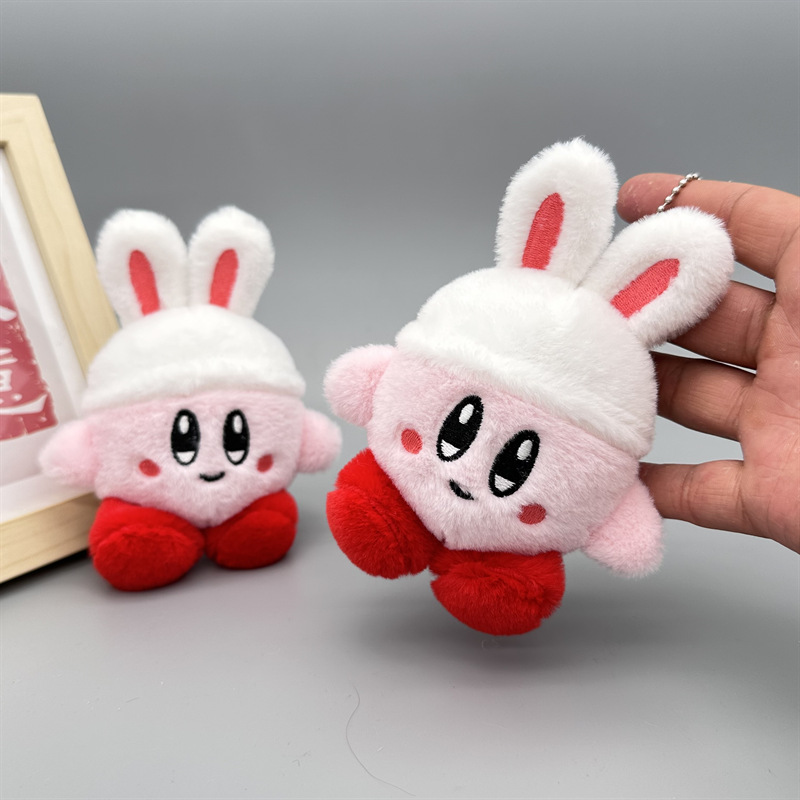 Máquina de agarrar muñecas de alta calidad, muñecas de peluche, lindas tarjetas, llaveros de automóviles de conejo, bolsos colgantes, pequeños regalos al por mayor