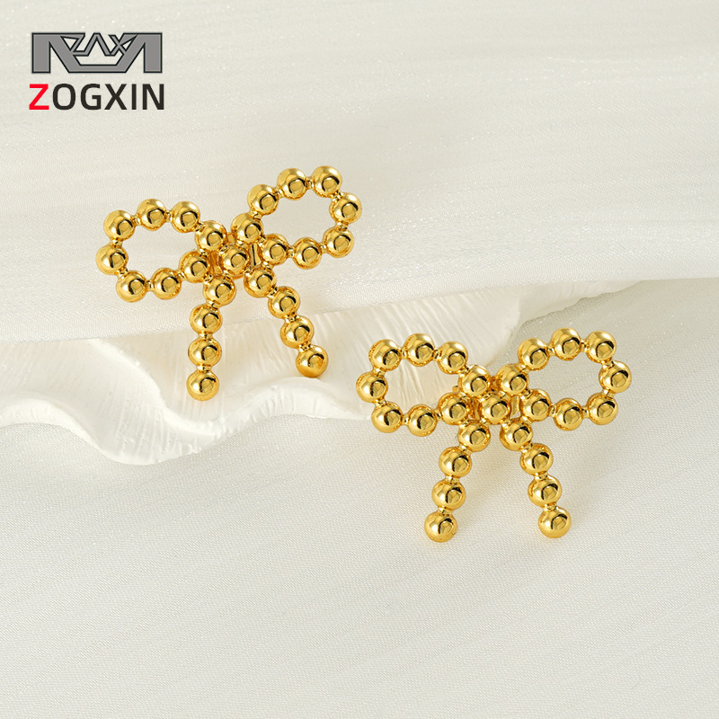Transfronterizo europeo y americano estilo ins nueva personalidad tendencia chapado en oro de 18k cuentas redondas de acero inoxidable aretes de lazo pendientes accesorios