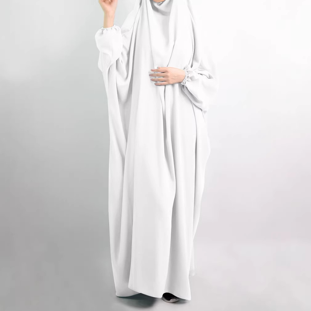 Plus-size, loose-fitting, comfortable, solid-color long dresses available for wholesale on AliExpress.