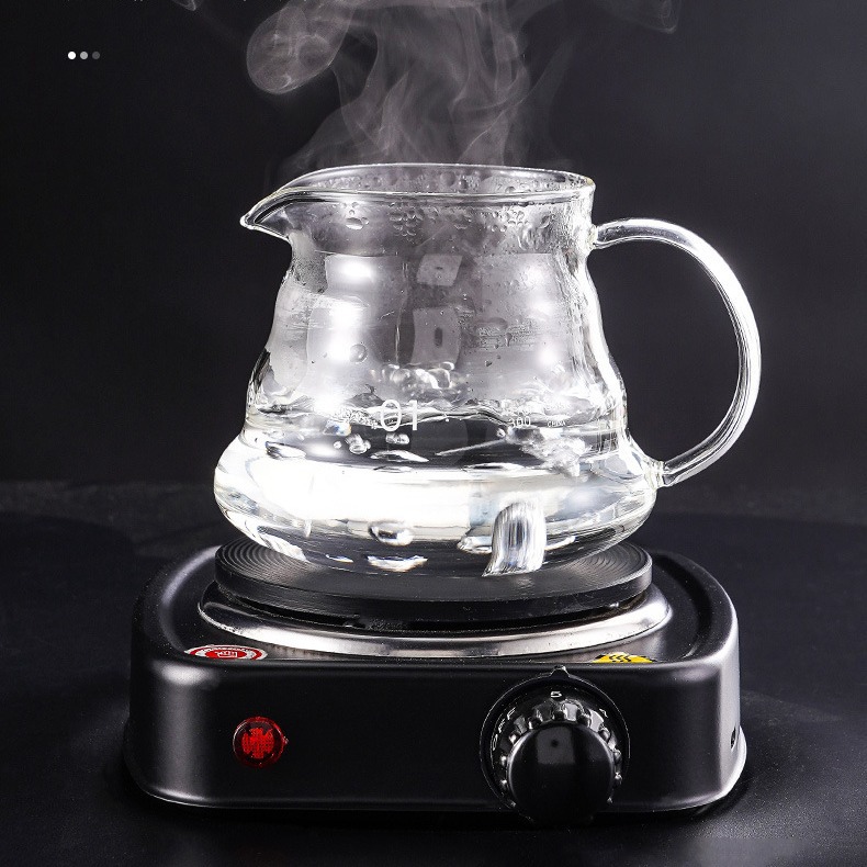 Glass coffee pot, cigarette holder, cloud