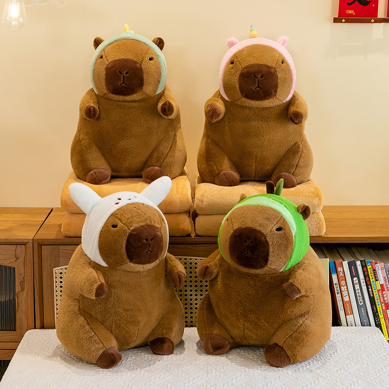 Caricatura capibara almohada manta dos en uno Carpibara cojín aire acondicionado es de doble uso niños siesta manta regalo