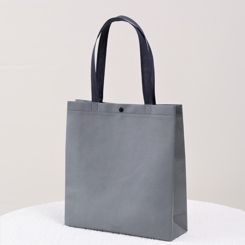 Internet celebrity women's clothing store concealed buckle non-woven handbag environmentally friendly handheld shopping bag women's clothing accessories can be printed with logo