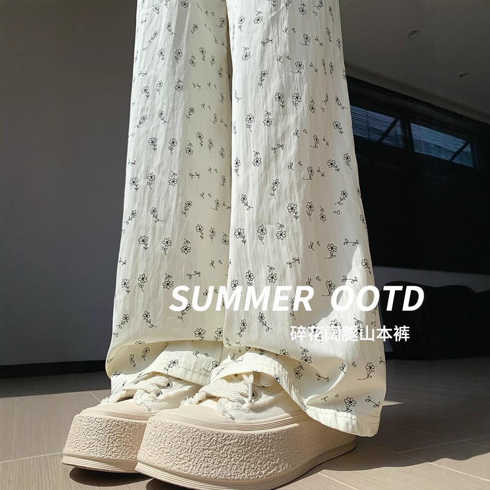Pantalón floral tiro alto blanco