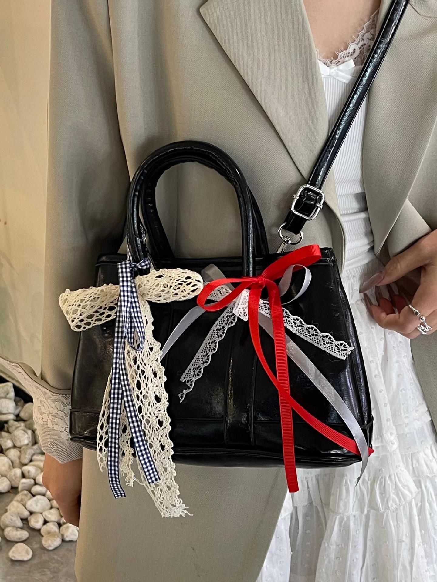 Bolsos de jardín portátiles populares de este año para mujer 2025 nuevos productos bolsos de hombro coreanos de nicho bolsos de cubo de todo fósforo de alta gama