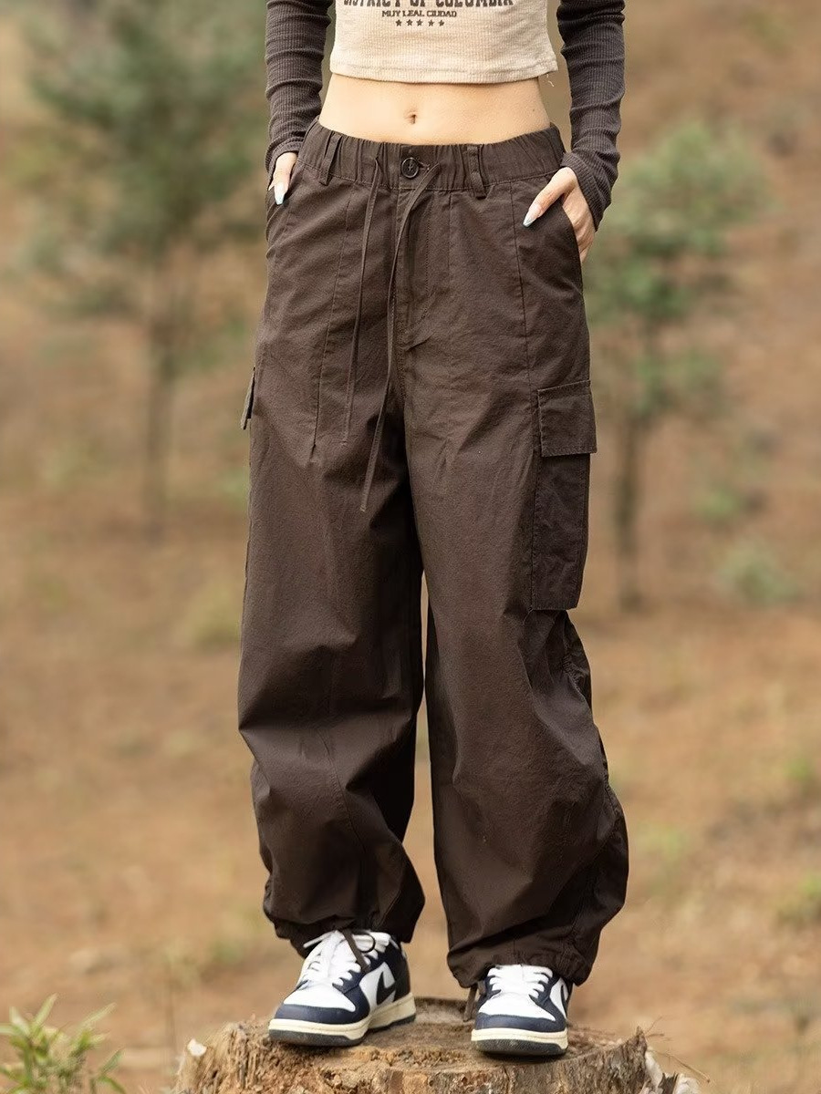 Estilo japonés americano al aire libre deportes delgados monopatín de pierna ancha los hombres y las mujeres con cordón ajustable suelta pantalones fregona
