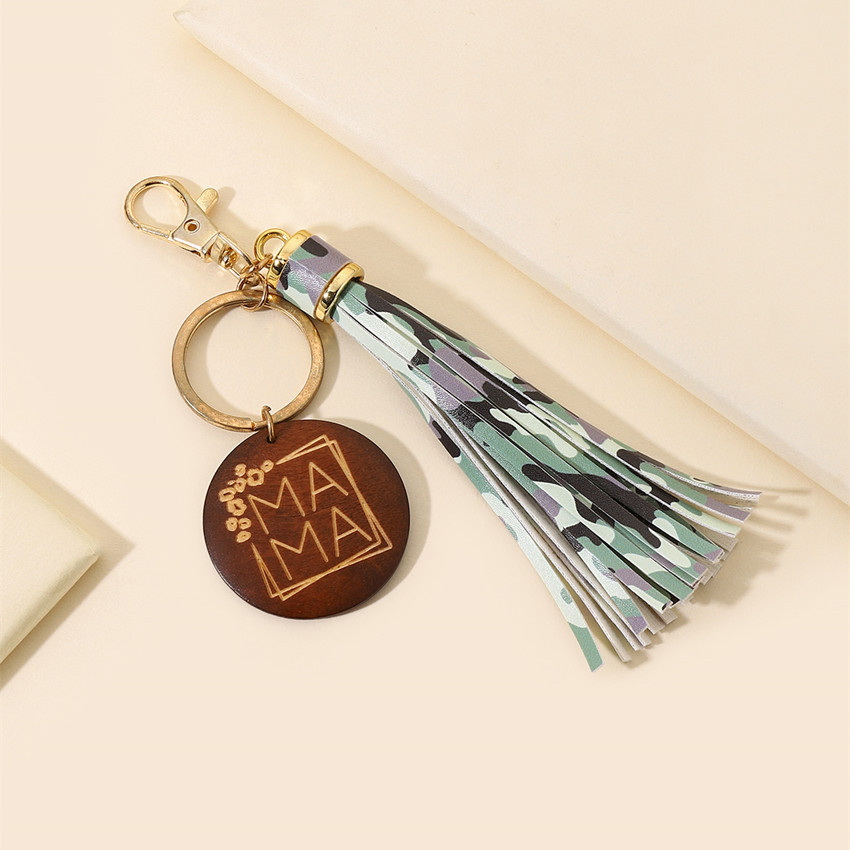 17g Weight Keychain Classification 1 Piece Quantity Casual, Holiday, Daily Occasion Pu Leather Material Mother'S Day Festival Letter, Tassel Pattern Unisex Gender Modern Style Style Modern Style Letter Tassel Pu Leather Mother'S Day Unisex Keychain 23