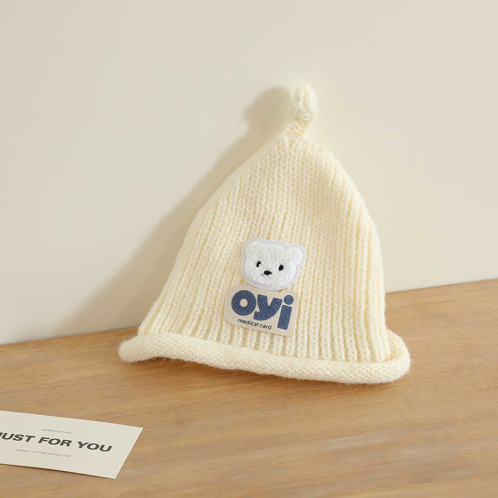 2024 otoño y invierno nuevo unisex lindo sombrero de punto de cabeza de oso simple sombrero de lana casual universal