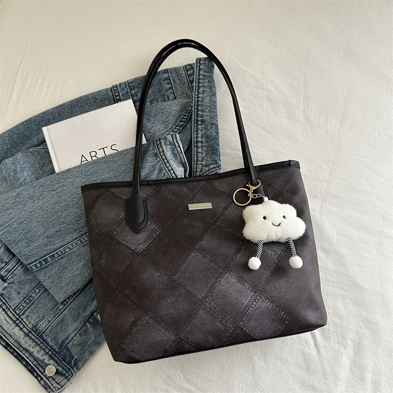 Casual retro bolso de gran capacidad para mujeres 2024 nueva moda moda bolso de hombro de tendencia de textura universal bolso de viaje