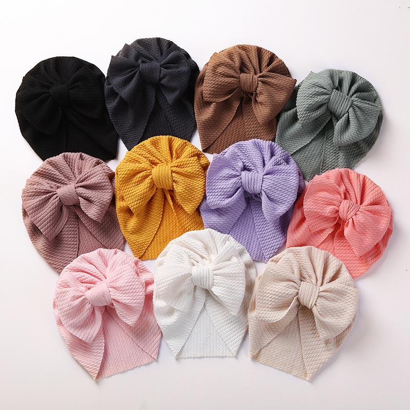 New Autumn And Winter Pit Strip Children's Hat Double-layer Bow Baby Cap display picture 1