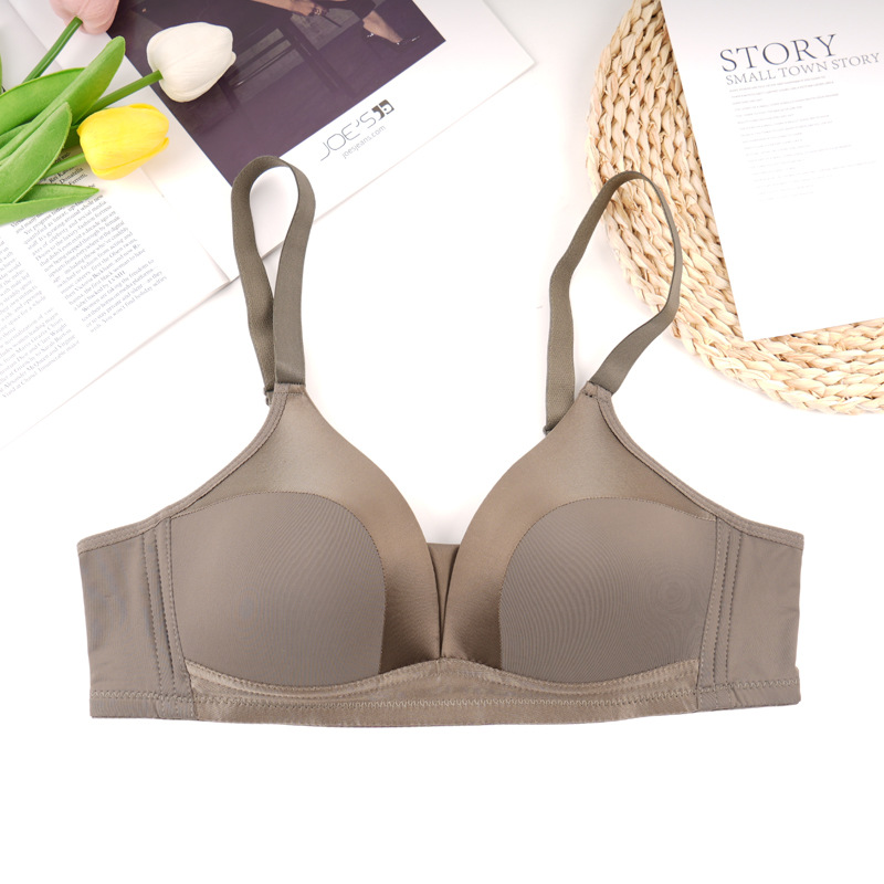 Fábrica de Shantou punto sin anillo de acero sujetador de mujer una pieza de ajuste cómodo sin marcas juntar sujetador de ropa interior anti-caída