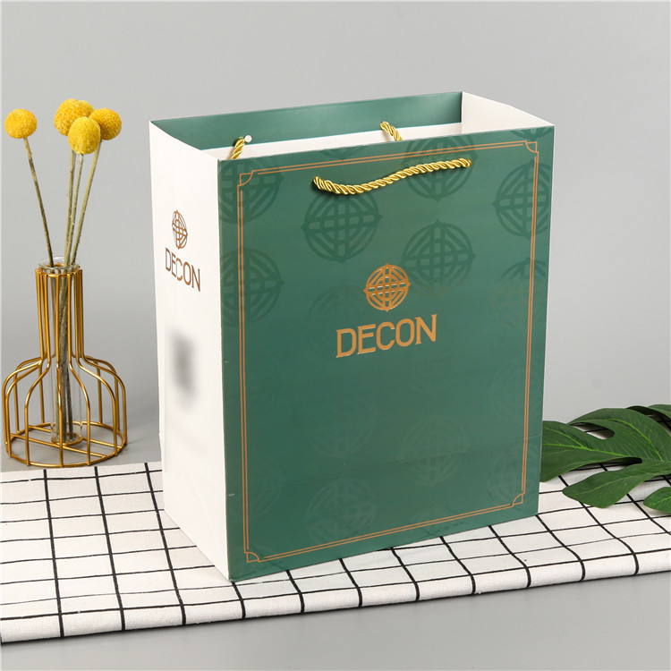 简约服装纸袋定 做礼品袋外卖购物袋牛皮纸手提袋厂家定 制logo