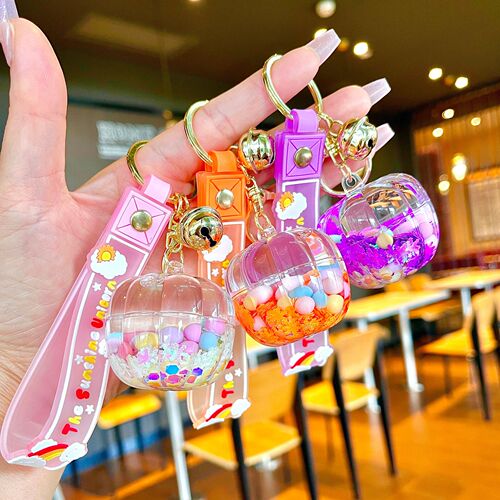 Oil-infused luminous pumpkin quicksand bottle key chain car pendant cartoon creative doll machine grab machine school bag gift pendant